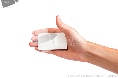 Image of Businessman's hand holding blank business card