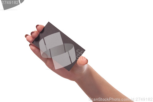 Image of Businesswoman's hand holding blank business card