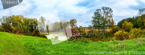 Image of Forest lake in fall. Panorama
