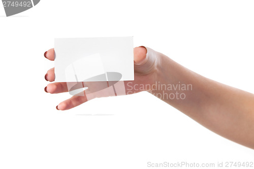 Image of Businesswoman's hand holding blank business card