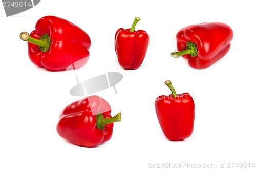 Image of set of red bell sweet peppers isolated on white