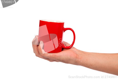 Image of Male hand is holding a red cup