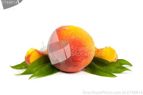 Image of One perfect, ripe peache with slices isolated on a white backgro