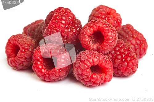 Image of Bunch of a red raspberry on a white background. Close up macro s