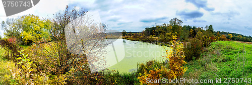 Image of Forest lake in fall. Panorama