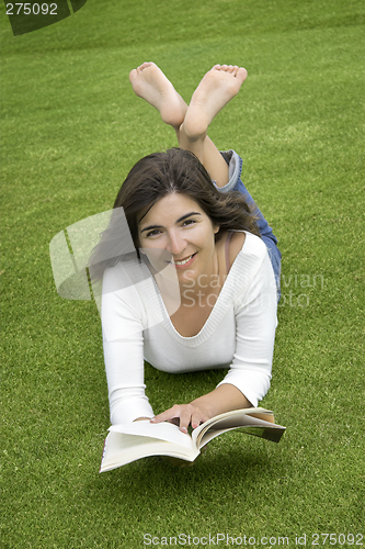 Image of Happy woman reading