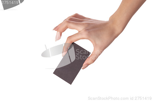 Image of Businesswoman's hand holding blank business card