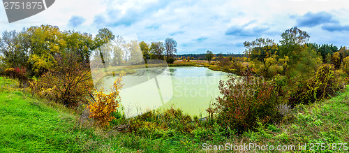 Image of Forest lake in fall. Panorama