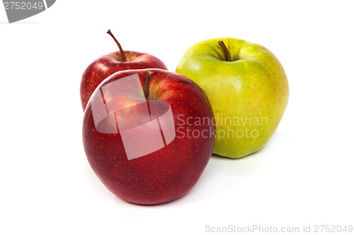 Image of A shiny red and green apples isolated on white