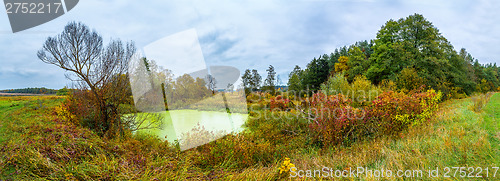 Image of Forest lake in fall. Panorama