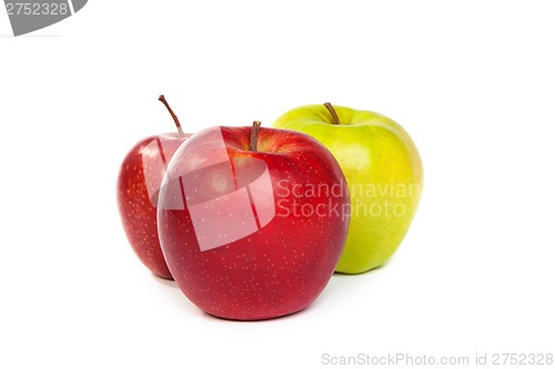 Image of A shiny red and green apples isolated on white