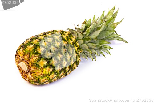 Image of Single pineapple isolated on white