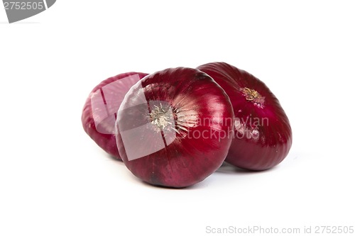 Image of Group of a red onions, isolated on white