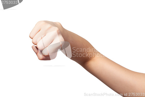 Image of Female hand with a clenched fist isolated