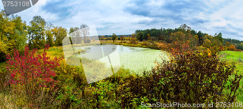 Image of Forest lake in fall. Panorama