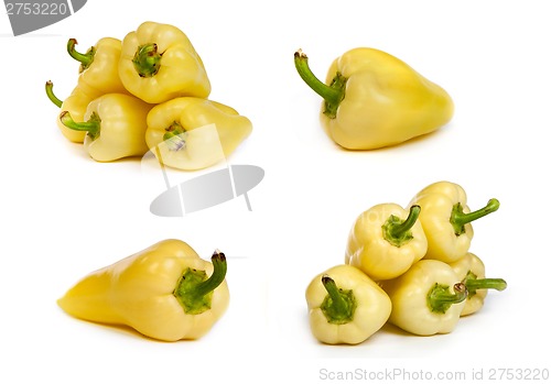 Image of set of yellow bell peppers isolated on white