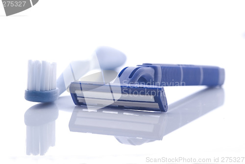 Image of Razor and toothbrush on white