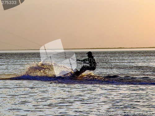 Image of Silhouette of a kitesurf on a gulf on a sunset 2
