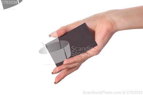 Image of Businesswoman's hand holding blank business card