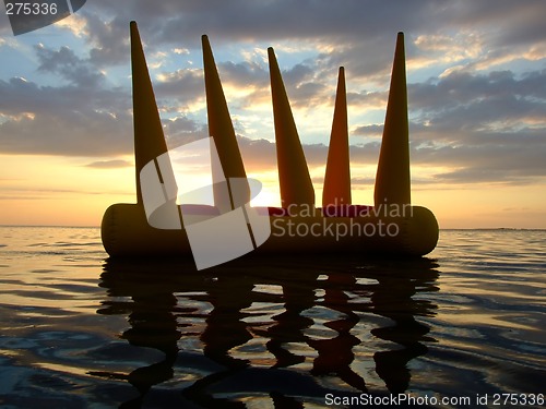 Image of Greater bright inflatable toy on water on a sunset 2