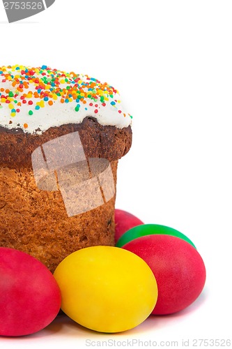Image of easter bread and eggs colored beautiful on white background