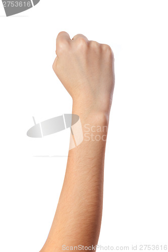 Image of Female hand with a clenched fist isolated