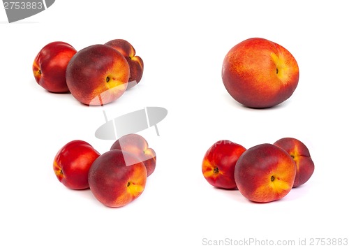 Image of set of fresh nectarines on white