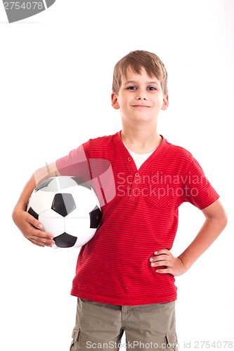 Image of Cute boy is holding a football ball. Soccer ball
