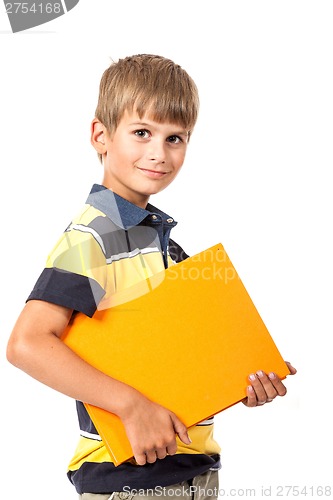 Image of School boy is holding a book