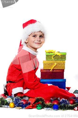 Image of Boy holding a christmas gift