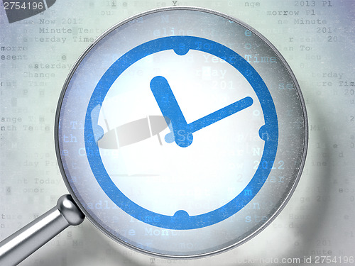 Image of Time concept:  Clock with optical glass on digital background
