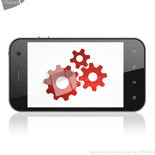Image of Data concept: Gears on smartphone