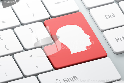 Image of Finance concept: Head on computer keyboard background
