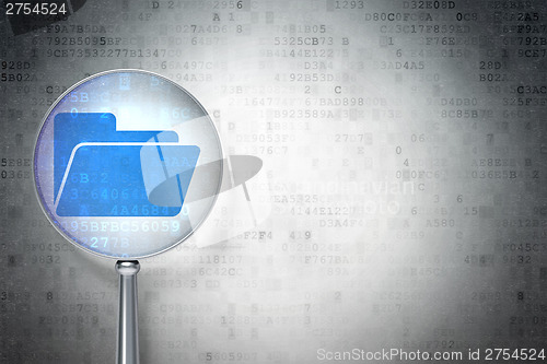 Image of Finance concept:  Folder with optical glass on digital backgroun