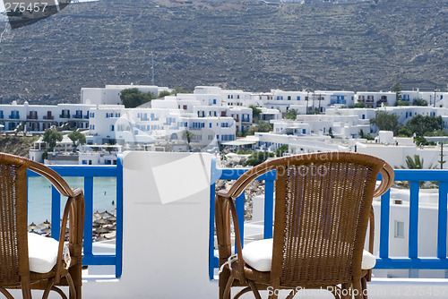 Image of view from hotel suite of greek island beach