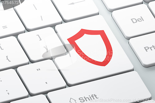 Image of Privacy concept: Contoured Shield on computer keyboard backgroun