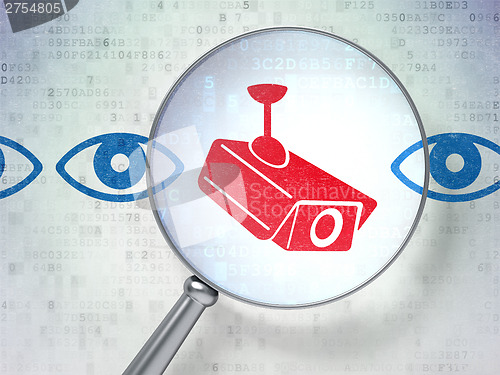 Image of Safety concept: Camera And Eye with optical glass on digital bac