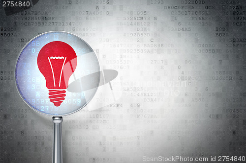 Image of Finance concept:  Light Bulb with optical glass on digital backg