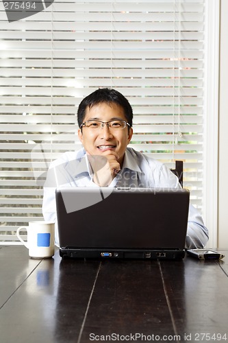 Image of Working businessman