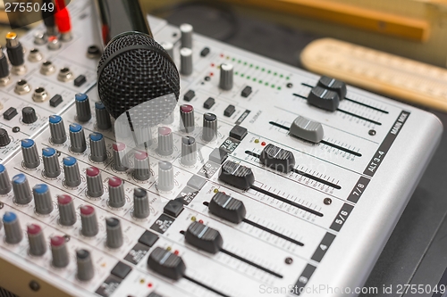 Image of Closeup photo of an audio mixer