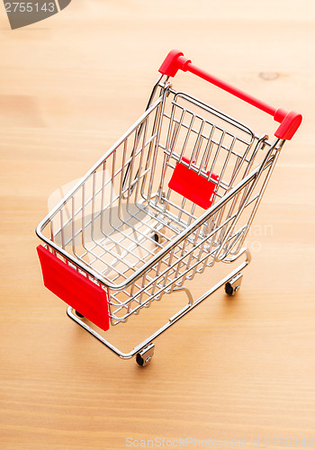 Image of Trolley on wooden background