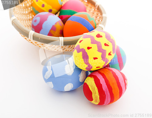 Image of Colourful easter egg in basket