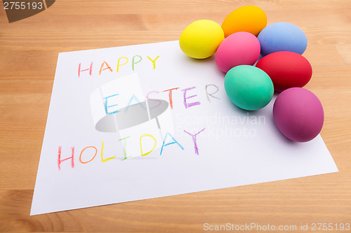 Image of Colourful painted easter egg and drawing