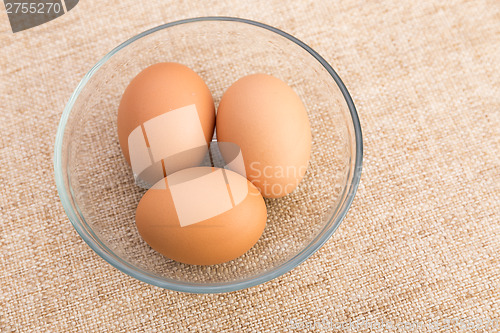 Image of Brown egg in bowl