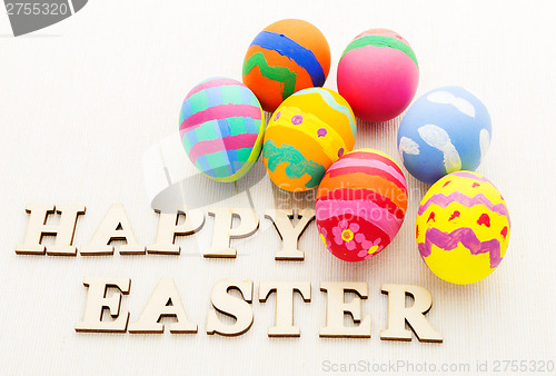 Image of Colourful design easter egg and wooden letter