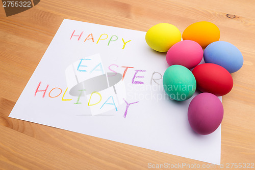 Image of Colourful easter egg and kid drawing