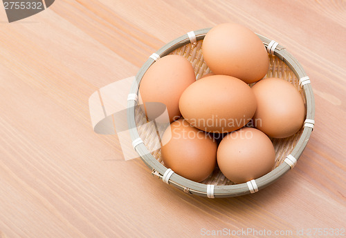 Image of Brown egg in basket
