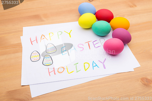 Image of Colourful easter egg and children drawing