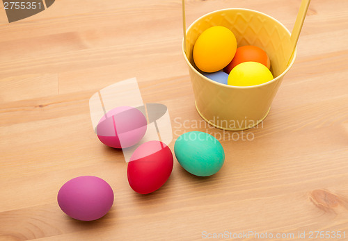 Image of Painted easter egg in bucket