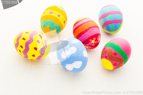 Image of Colourful easter egg on linen background